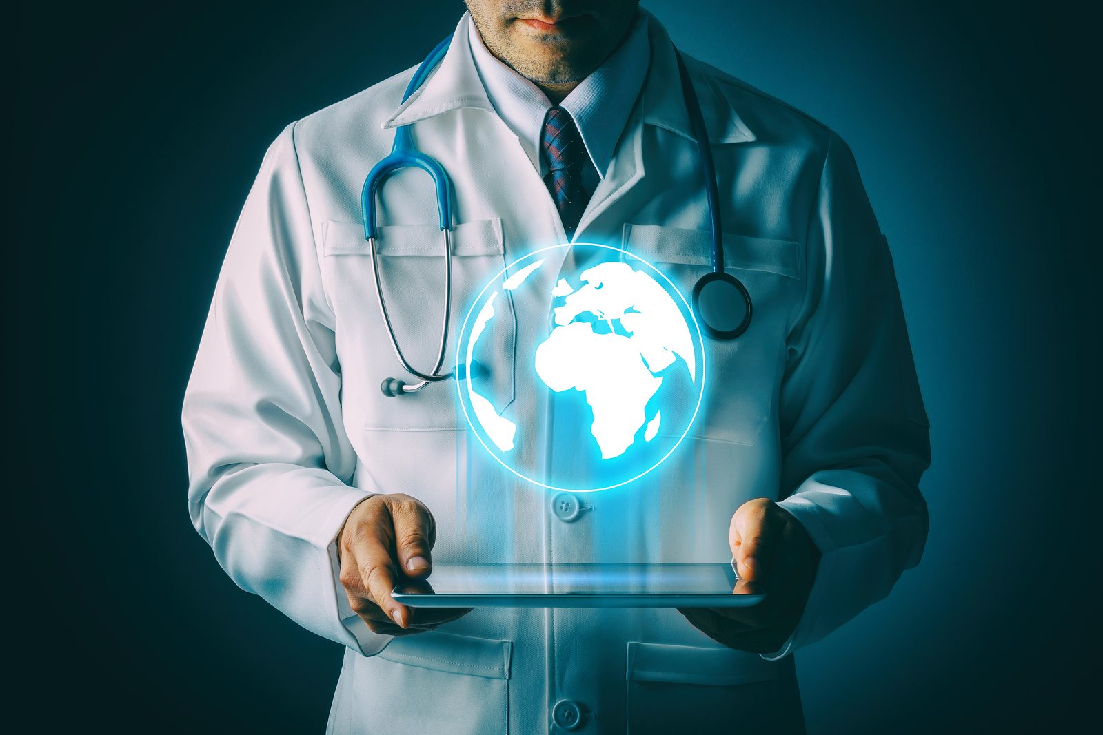 globe hologram from tablet with doctor